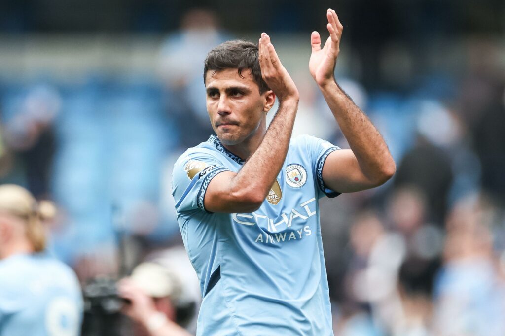 Rodri of Manchester City applauds the home fans during the Premier League match Manchester City vs Brentford at Etihad Stadium, Manchester, United Kingdom, 14th September 2024(Photo by Mark Cosgrove/News Images)